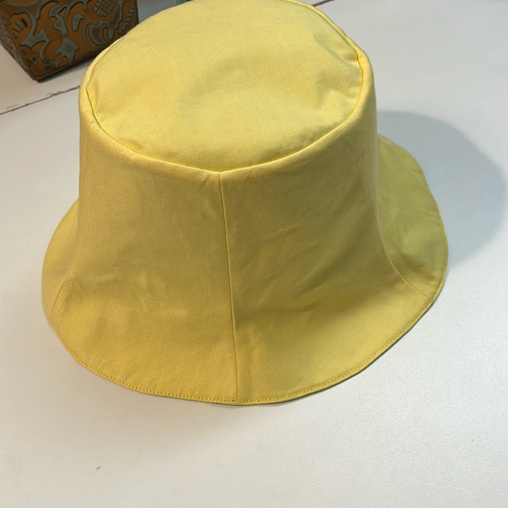 green and yellow hat
